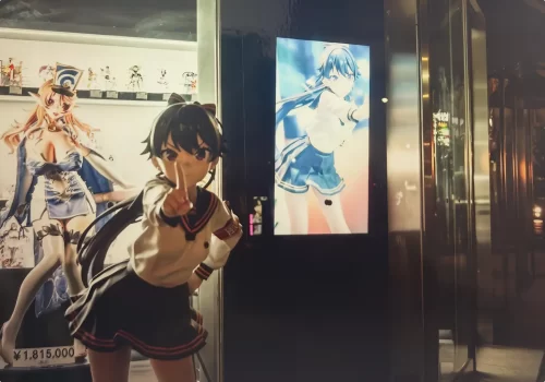 Nighttime portrait "Night Owl & Uyu" of the 1/1 Life-Size Figure "alphauyu," photographed in the streets of Akihabara, Tokyo. Case study for large-scale promotional fabrication.